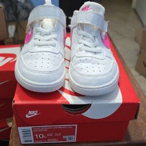 Used Nike Kids White Sneakers with Pink Accents Size 10